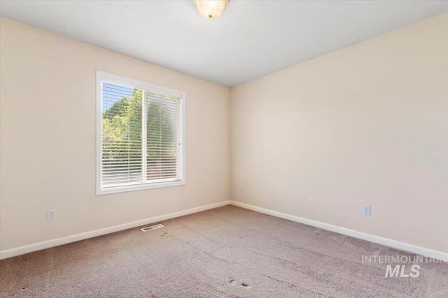 3314 S Raintree, Nampa, ID 83669 - carpeted spare room with baseboards