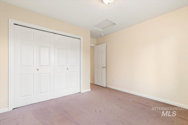 3314 S Raintree, Nampa, ID 83669 - unfurnished bedroom featuring attic access, carpet, and a closet