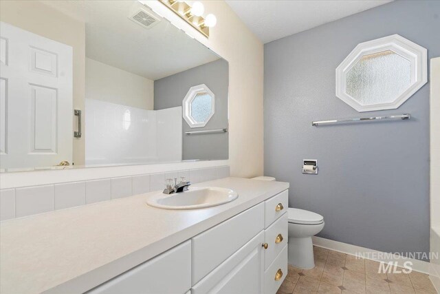 3314 S Raintree, Nampa, ID 83669 - full bath with vanity and tile patterned floors
