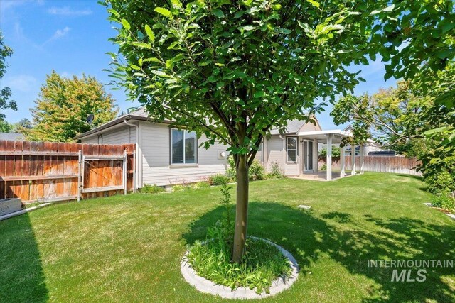 3314 S Raintree, Nampa, ID 83669 - fenced backyard featuring a gate