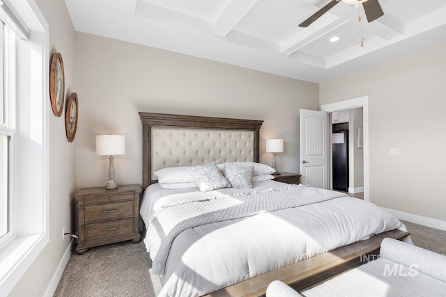 bedroom featuring coffered ceiling, carpet flooring, a ceiling fan, baseboards, and beamed ceiling