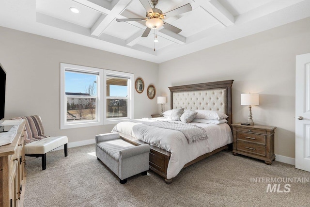 bedroom featuring baseboards, coffered ceiling, beamed ceiling, and light colored carpet