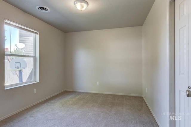 4935 N Rathbone Ave, Meridian, ID 83646 - spare room with carpet