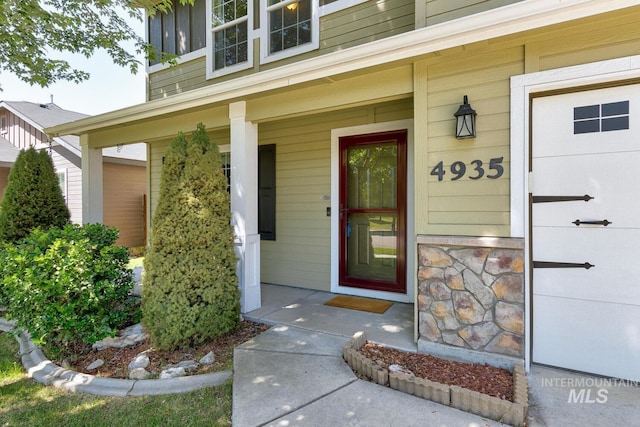 4935 N Rathbone Ave, Meridian, ID 83646 - property entrance featuring a porch