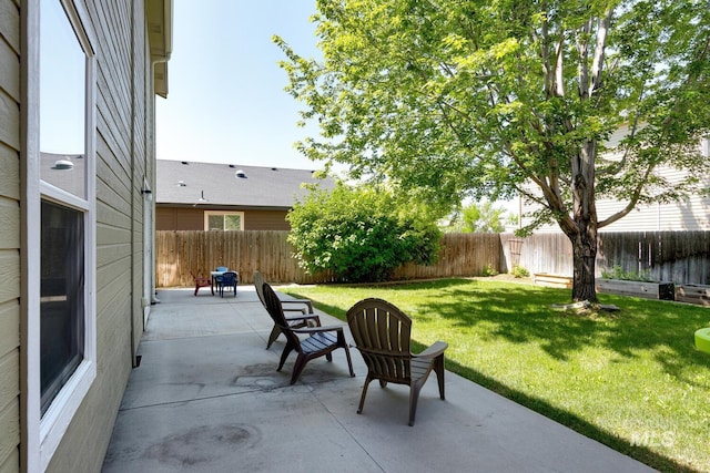 4935 N Rathbone Ave, Meridian, ID 83646 - fenced backyard with a patio