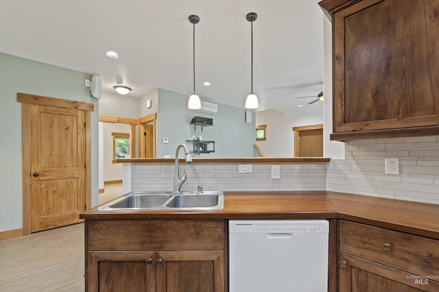 1649 Bear Trl, Donnelly, ID 83615 - kitchen featuring dishwasher, tasteful backsplash, decorative light fixtures, a ceiling fan, and light wood-style flooring