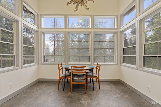 1649 Bear Trl, Donnelly, ID 83615 - sunroom featuring healthy amount of natural light and stone finish floors
