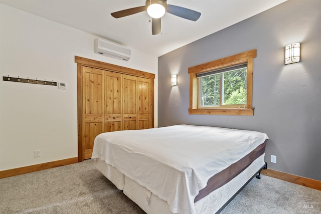 1649 Bear Trl, Donnelly, ID 83615 - carpeted bedroom featuring a wall mounted AC and ceiling fan