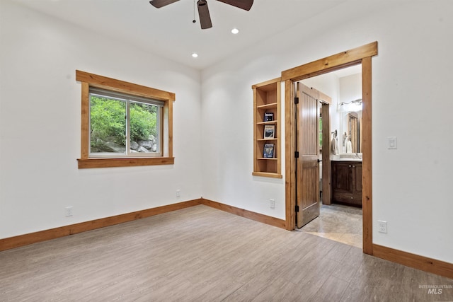 1649 Bear Trl, Donnelly, ID 83615 - empty room with wood finished floors, ceiling fan, and recessed lighting