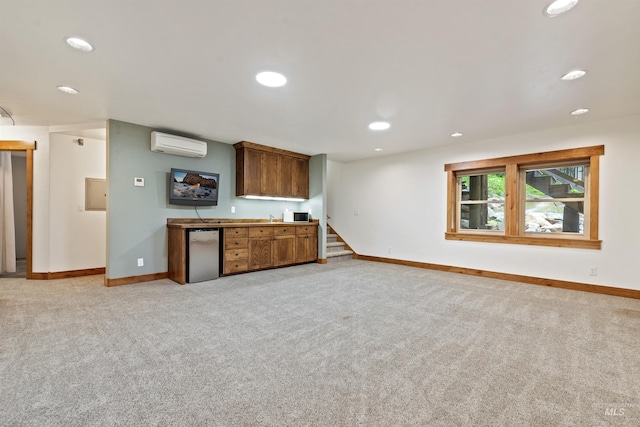 1649 Bear Trl, Donnelly, ID 83615 - unfurnished living room with a wall mounted air conditioner, light colored carpet, recessed lighting, stairway, and bar