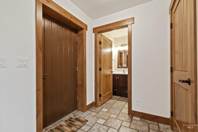 1649 Bear Trl, Donnelly, ID 83615 - hallway featuring baseboards and stone finish floors