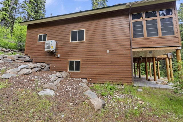 1649 Bear Trl, Donnelly, ID 83615 - view of side of property featuring an ac unit