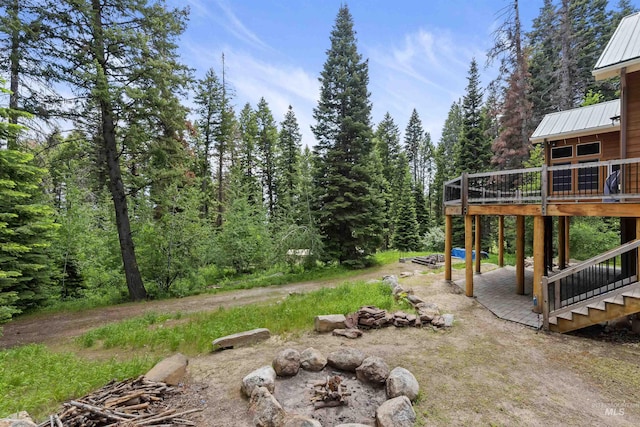 1649 Bear Trl, Donnelly, ID 83615 - view of yard featuring a deck, stairs, and a patio