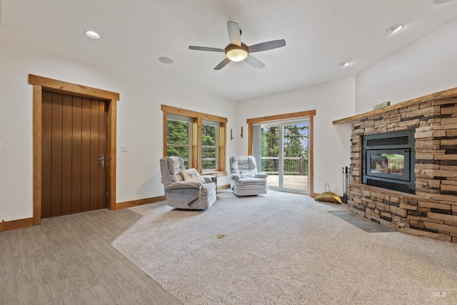 1649 Bear Trl, Donnelly, ID 83615 - living area featuring a ceiling fan, a stone fireplace, light wood-type flooring, and recessed lighting