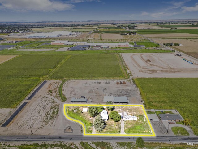 birds eye view of property featuring a rural view