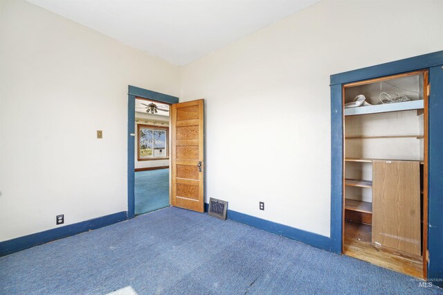 unfurnished bedroom featuring carpet floors