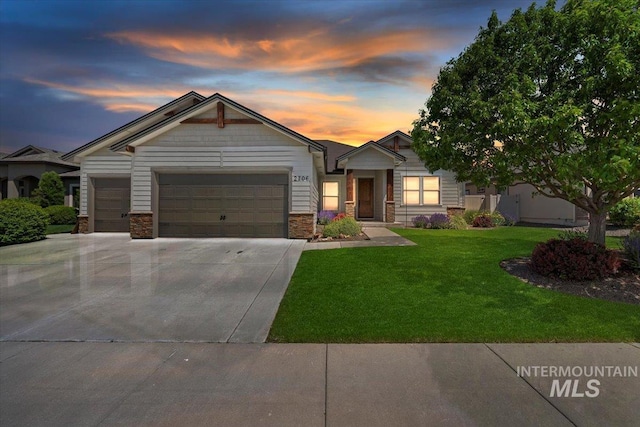 2706 E Rochester Ct, Meridian, ID 83646 - craftsman-style home with an attached garage, a front lawn, driveway, and stone siding
