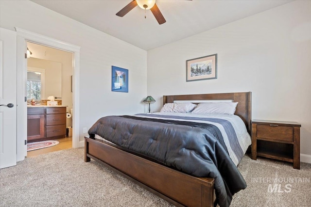 2706 E Rochester Ct, Meridian, ID 83646 - bedroom featuring light colored carpet, ensuite bathroom, and ceiling fan
