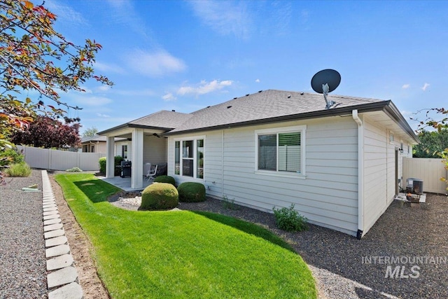 2706 E Rochester Ct, Meridian, ID 83646 - back of house featuring a patio, central air condition unit, and a shingled roof