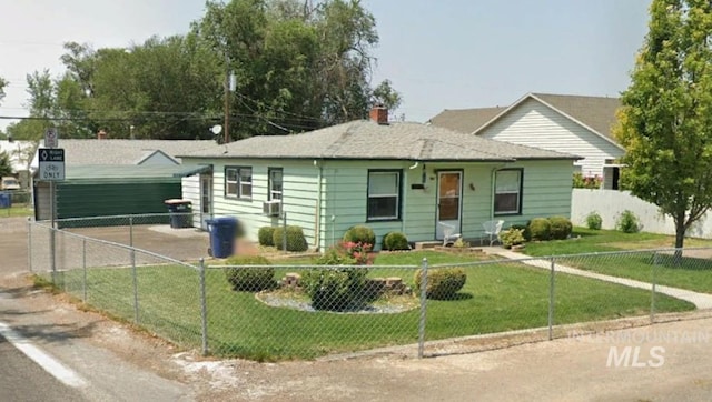 view of front of home with a fenced front yard, cooling unit, a chimney, and a front lawn