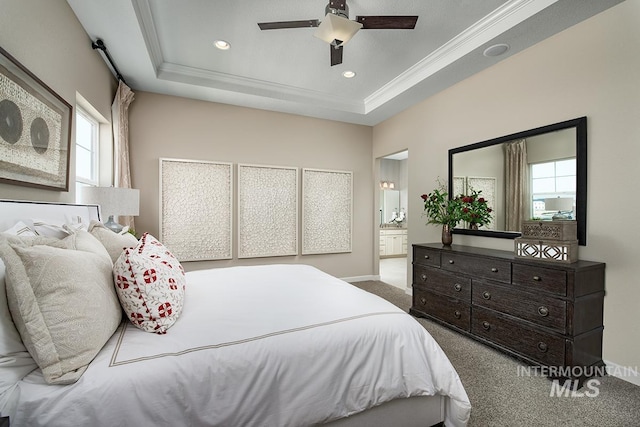 bedroom featuring recessed lighting, carpet flooring, ornamental molding, and a raised ceiling