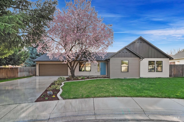 1069 N Marsh Hawk Pl, Eagle, ID 83616 - view of front of home featuring a garage, board and batten siding, and driveway