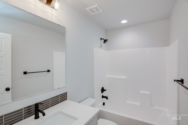 bathroom with visible vents, toilet, recessed lighting, vanity, and shower / bathtub combination