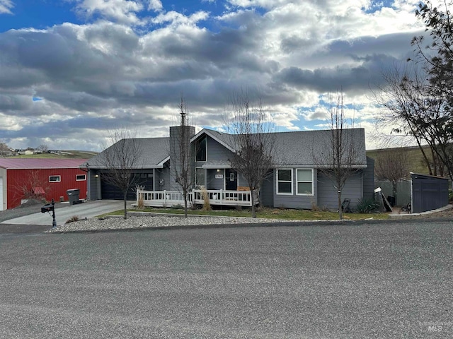 ranch-style house featuring a garage