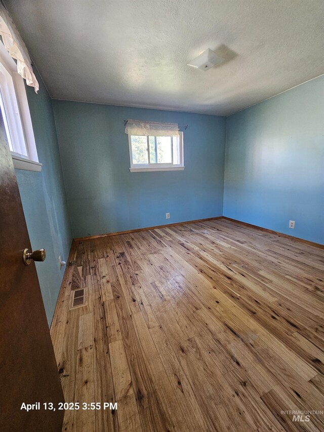 314 S Phillippi St, Boise, ID 83705 - unfurnished room with hardwood / wood-style floors