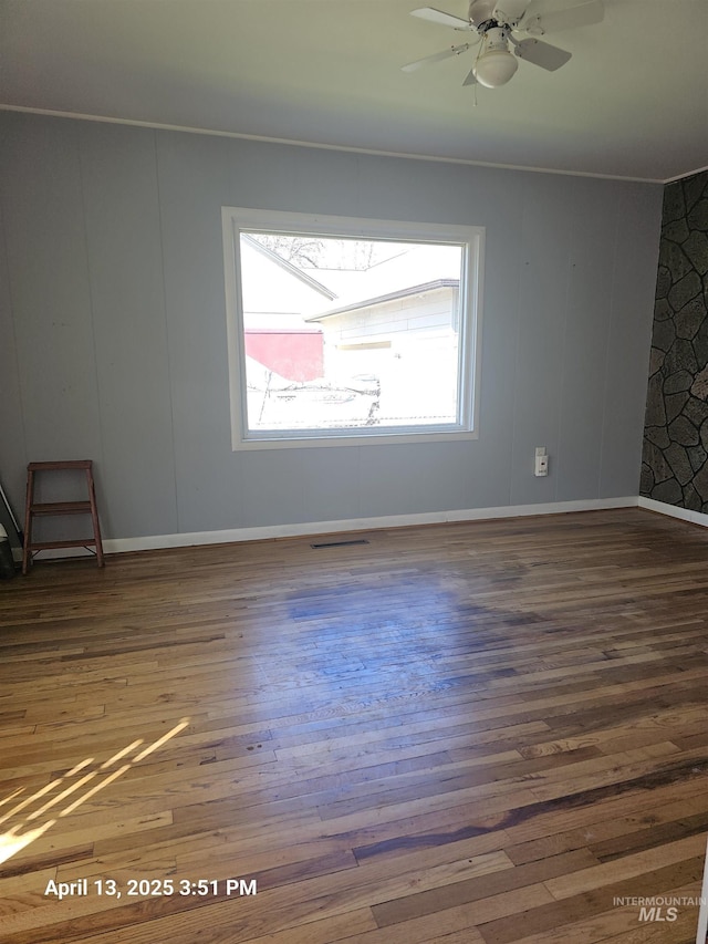 314 S Phillippi St, Boise, ID 83705 - empty room with wood finished floors, baseboards, a ceiling fan, and ornamental molding