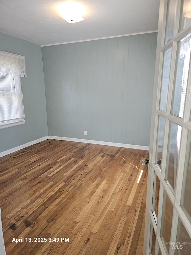 314 S Phillippi St, Boise, ID 83705 - spare room featuring wood finished floors and baseboards