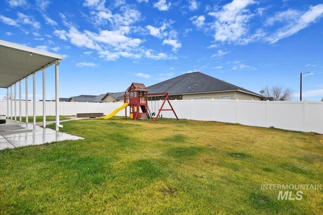 view of yard with a playground