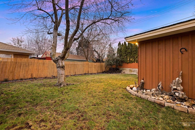view of yard with a fenced backyard