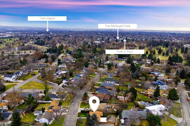 aerial view at dusk with a residential view