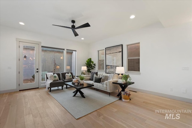 living room with recessed lighting, baseboards, wood finished floors, and a ceiling fan