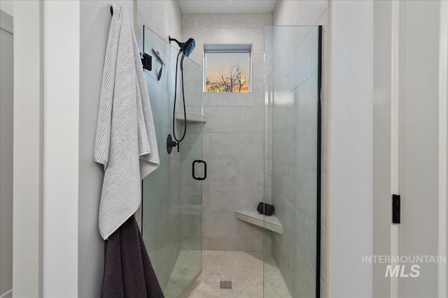 full bath featuring a stall shower