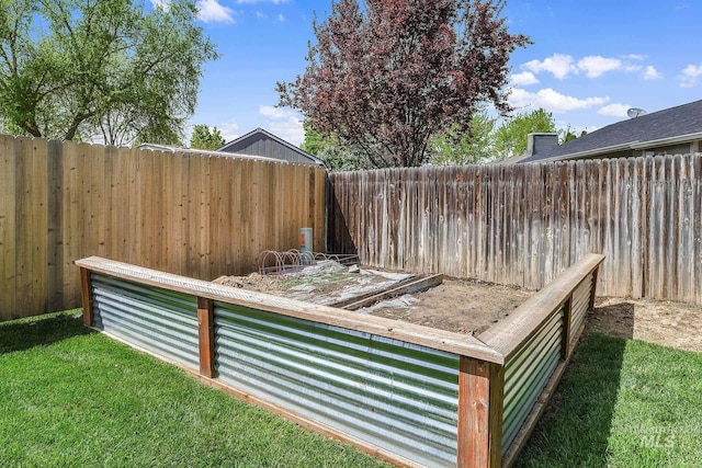 view of yard with a fenced backyard