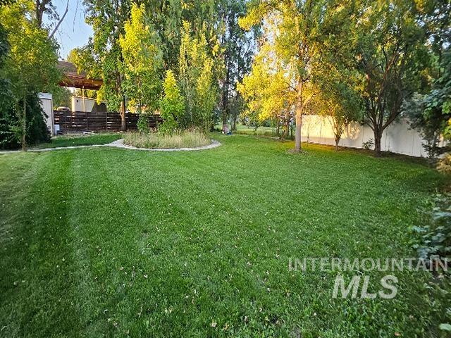 view of yard with fence