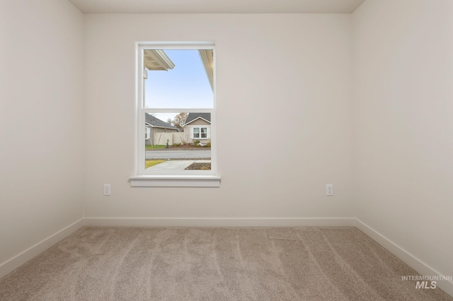 view of carpeted spare room