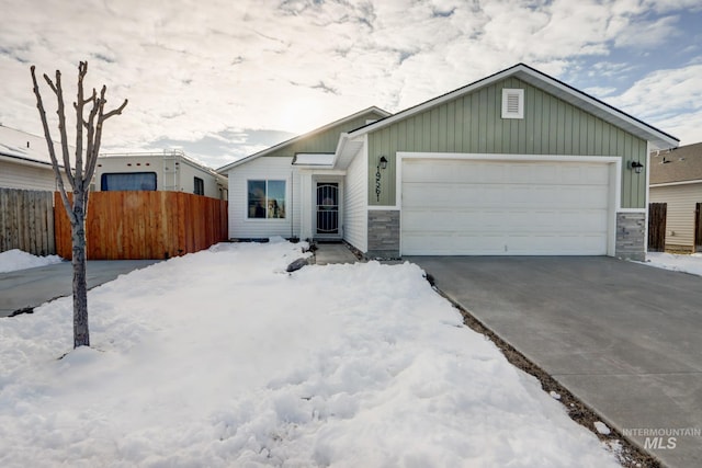 single story home with a garage