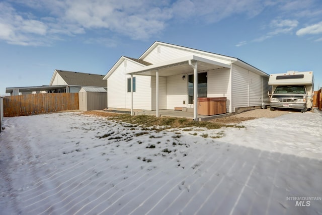 exterior space with a shed