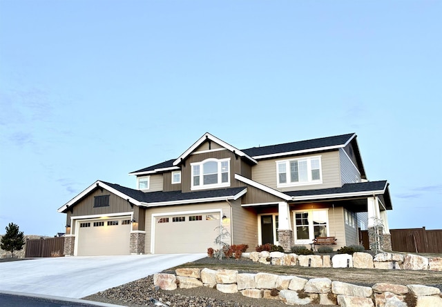 craftsman inspired home with a garage