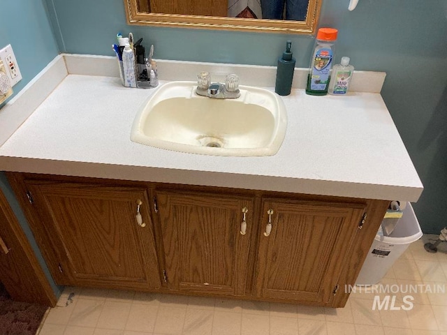 776 16th St, Vale, OR 97918 - bathroom with vanity and tile patterned flooring