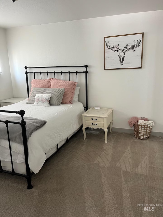 640 Roosevelt Ave, Grand View, ID 83624 - carpeted bedroom with baseboards