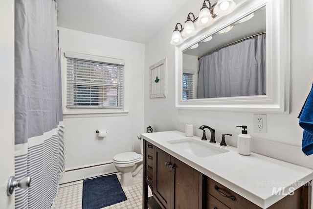 92 N Yale St, Nampa, ID 83651 - full bath featuring toilet, baseboard heating, and vanity