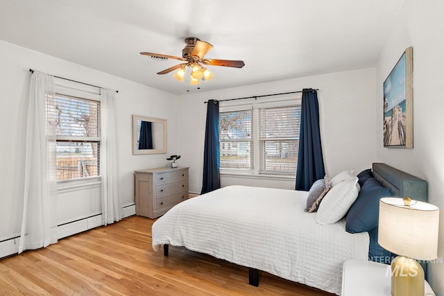 92 N Yale St, Nampa, ID 83651 - bedroom featuring light wood-style floors and a ceiling fan
