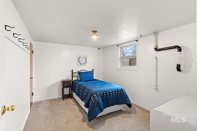 92 N Yale St, Nampa, ID 83651 - carpeted bedroom featuring a textured ceiling