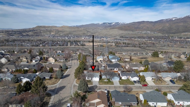 drone / aerial view with a mountain view and a residential view