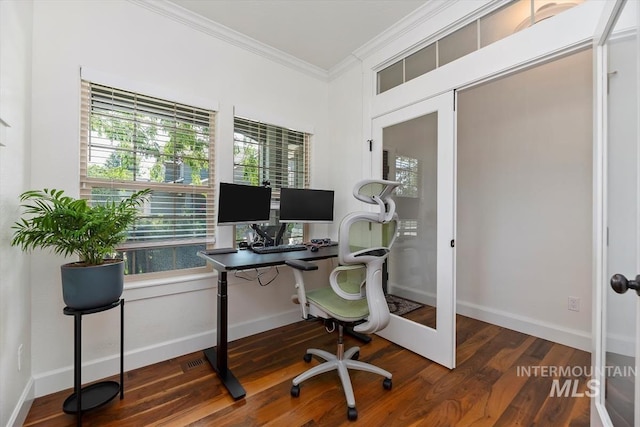 home office with crown molding, dark wood-type flooring, and french doors