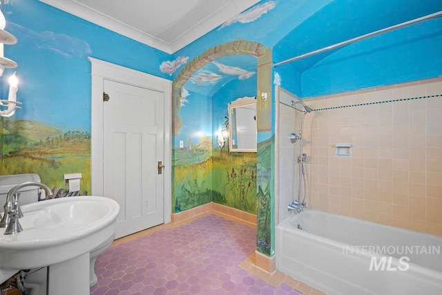 full bathroom with a sink, baseboards, tile patterned flooring, and shower / bathtub combination